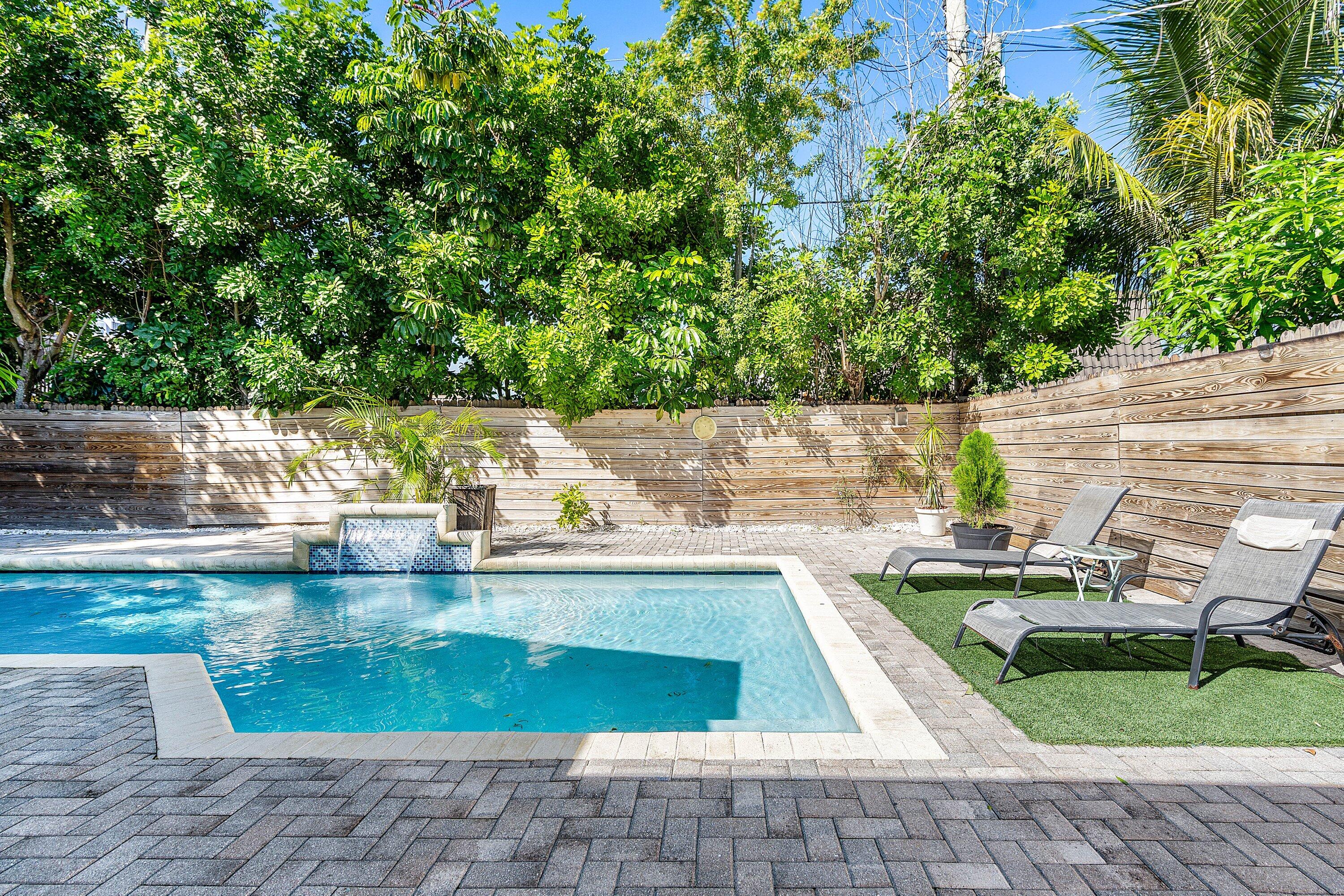 22207 Southwest 65th Terrace Boca Raton, FL 33428 - Photo 20 of 27 a view of swimming pool from a lounge chair