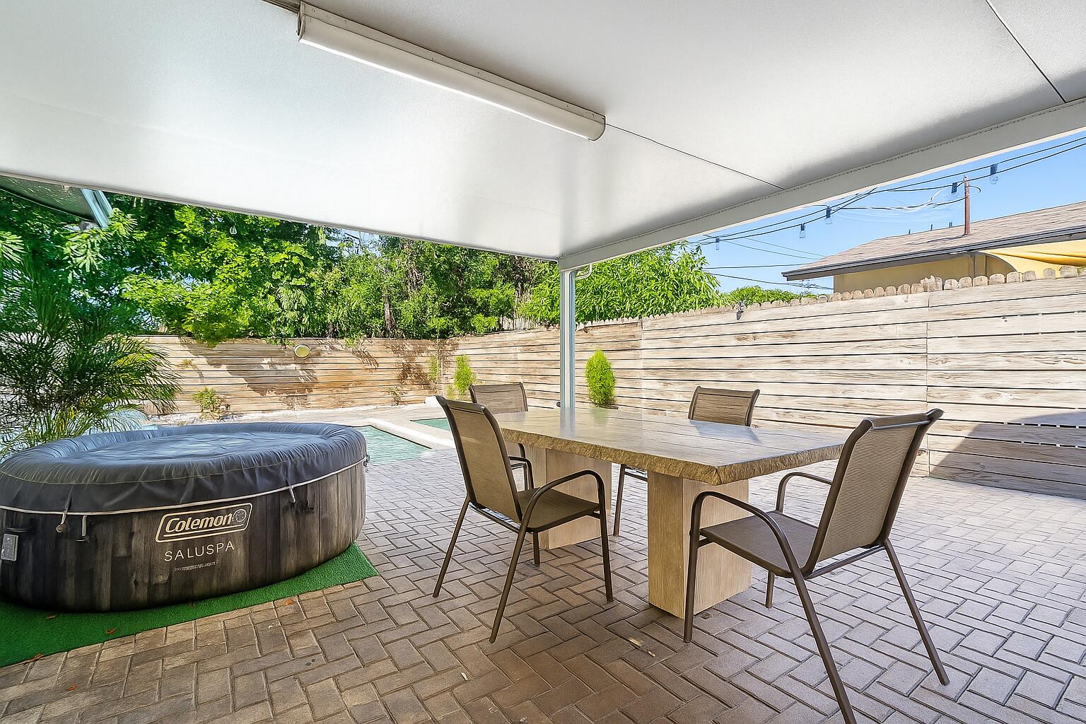 22207 Southwest 65th Terrace Boca Raton, FL 33428 - Photo 26 of 27 a view of an outdoor sitting area with furniture