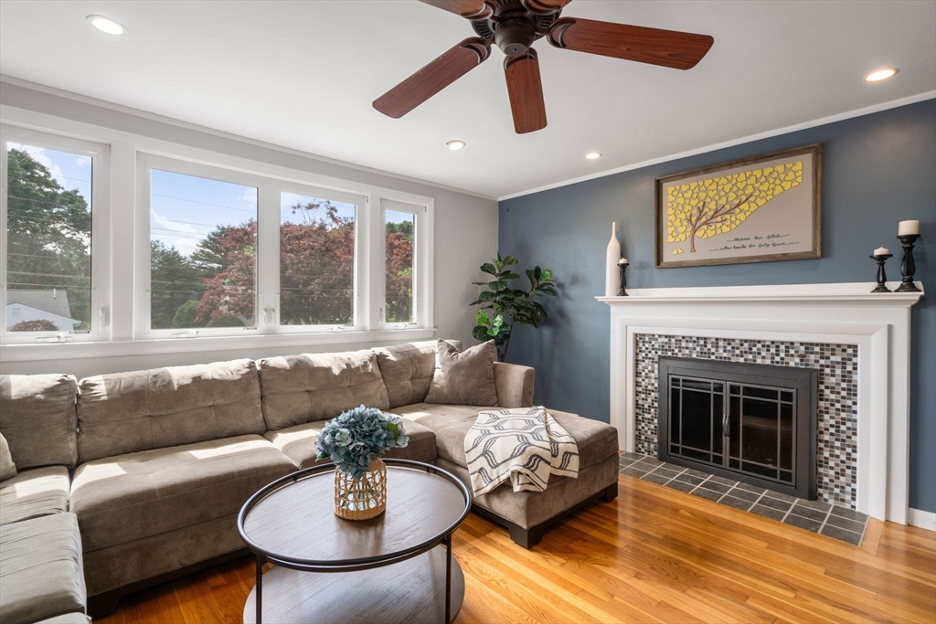 26 Crest Road Framingham, MA 01702 - Photo 11 of 39 a living room with furniture and a fireplace
