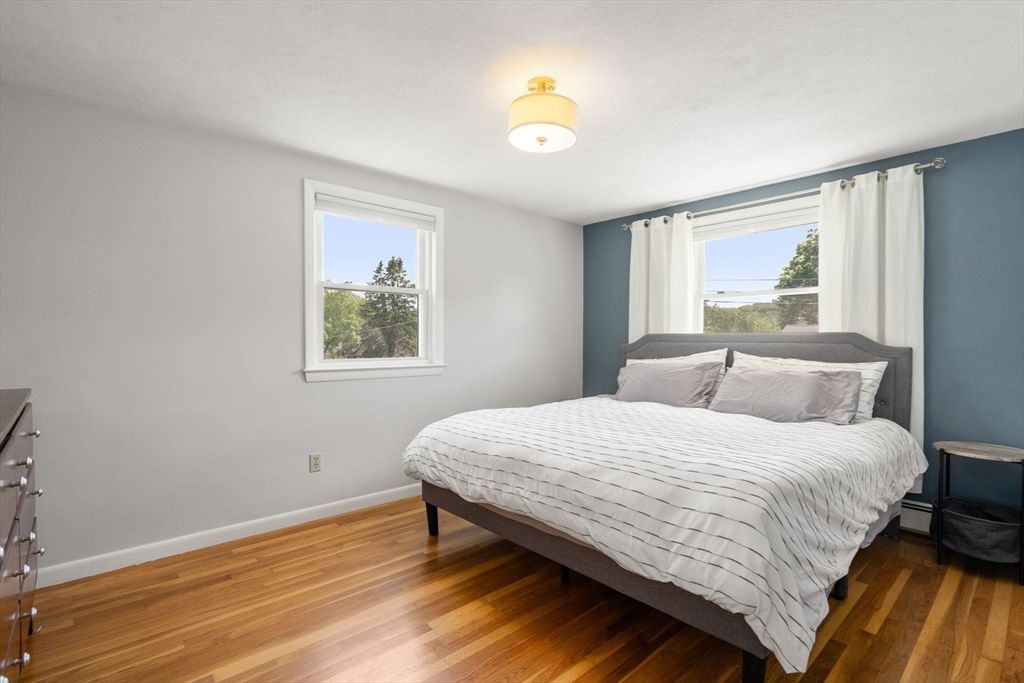26 Crest Road Framingham, MA 01702 - Photo 19 of 39 a bedroom with a bed and a window