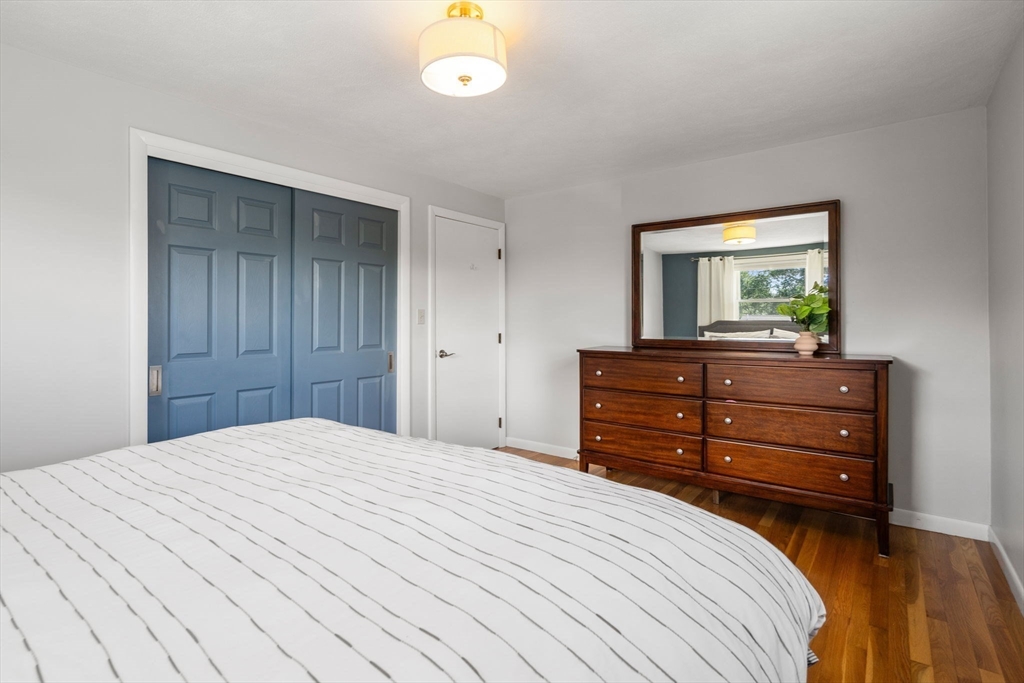 26 Crest Road Framingham, MA 01702 - Photo 20 of 39 a bedroom with a bed and a dresser