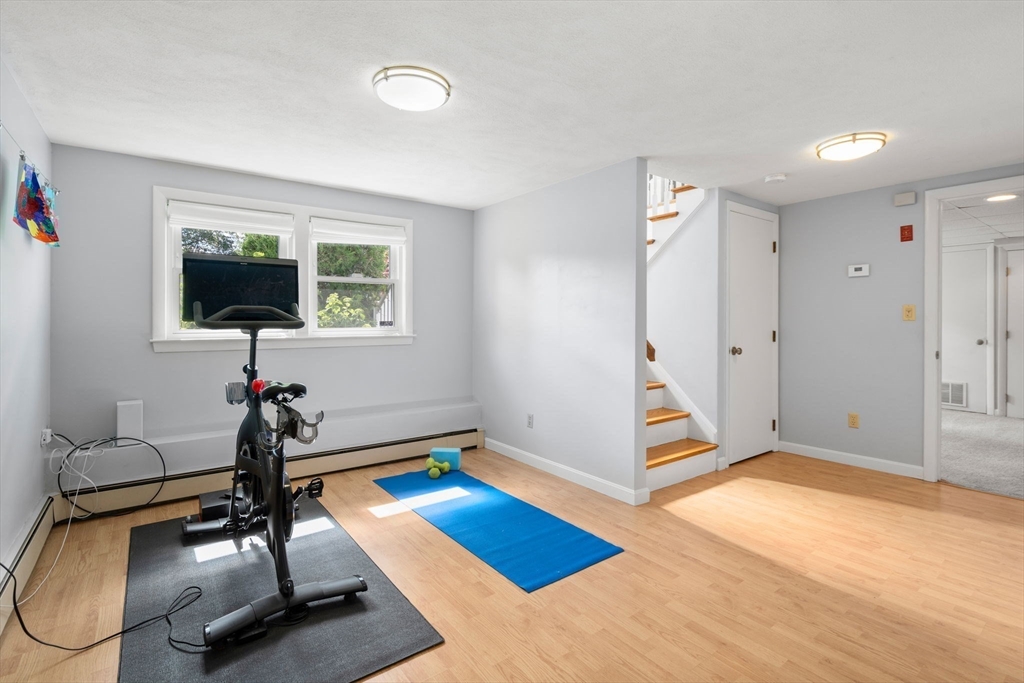 26 Crest Road Framingham, MA 01702 - Photo 28 of 39 a room with gym equipment and a window