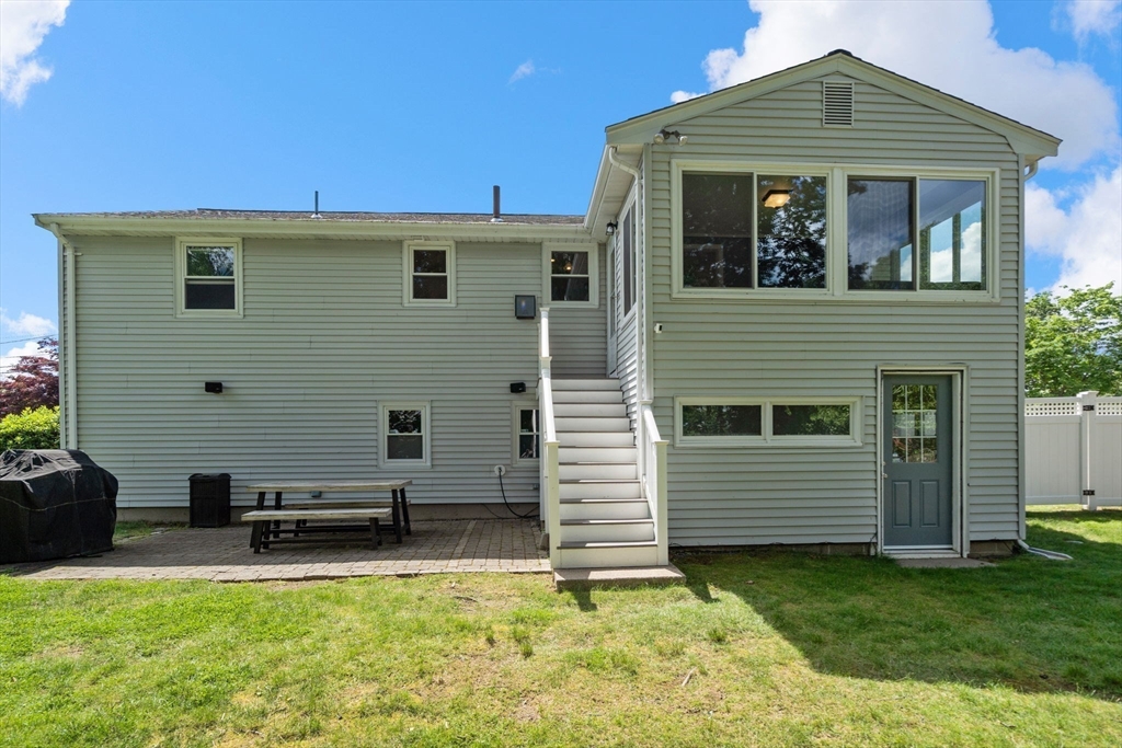 26 Crest Road Framingham, MA 01702 - Photo 34 of 39 a view of a house with a backyard