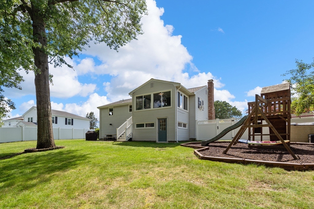 26 Crest Road Framingham, MA 01702 - Photo 38 of 39 a view of a house with backyard