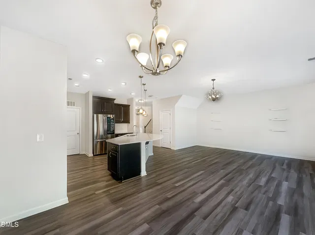 a view of kitchen and sink