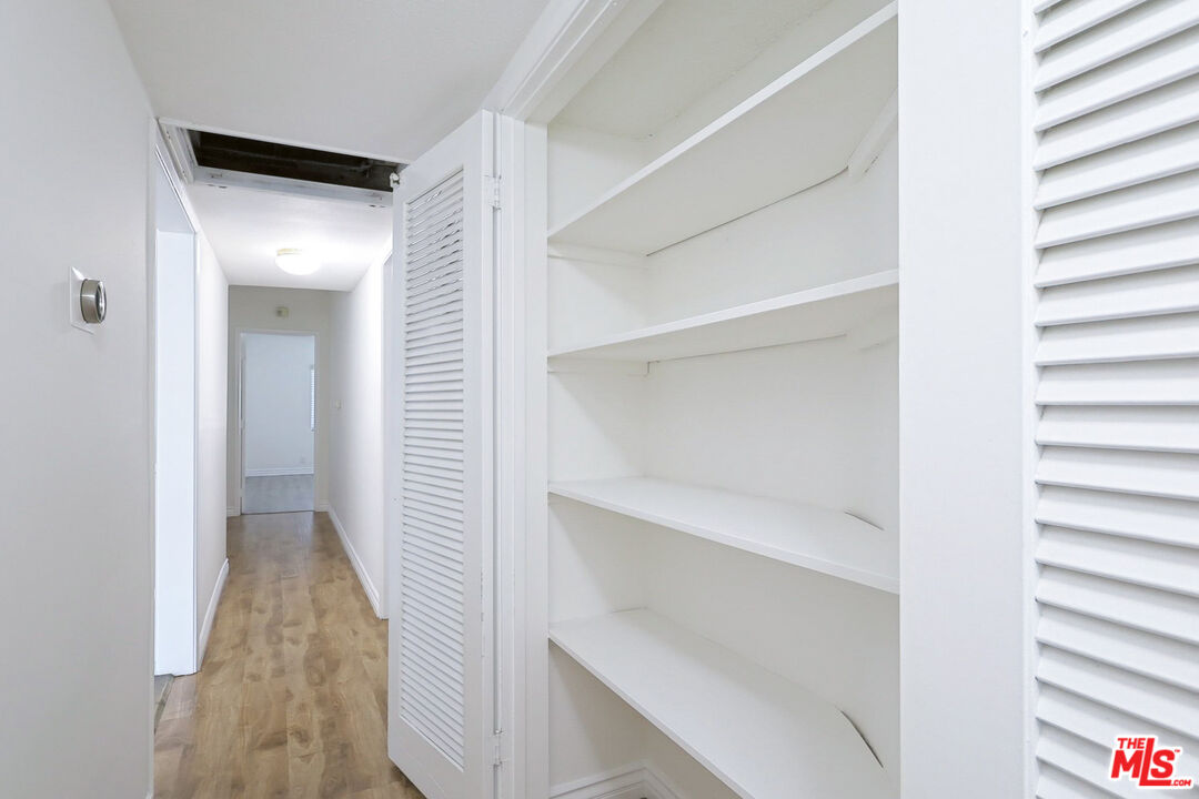 262 MacDonald Street Pasadena, CA 91103 - Photo 15 of 22 a view of a hallway with wooden floor