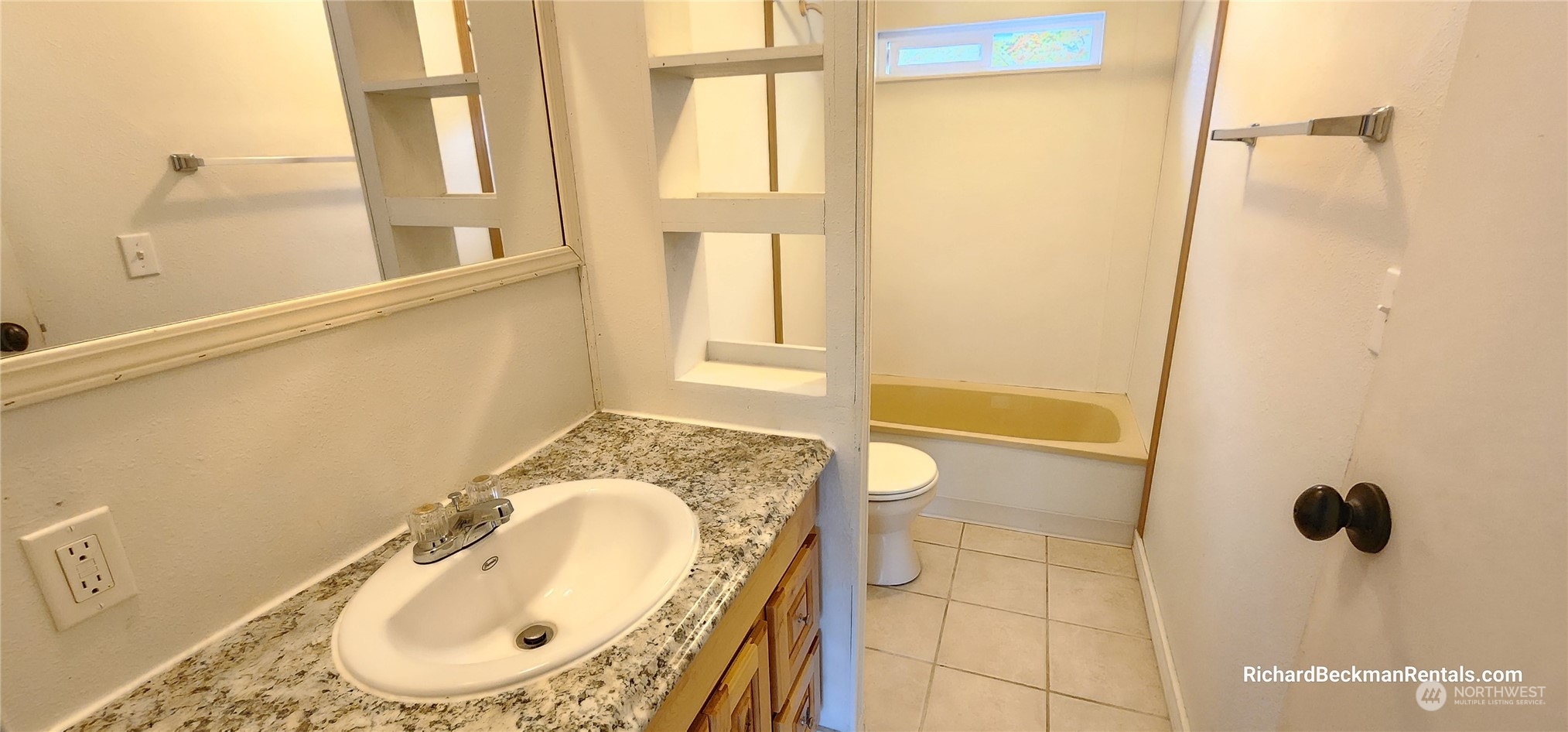 40 Southeast My Road Shelton, WA 98584 - Photo 15 of 25 a bathroom with a granite countertop sink and a mirror