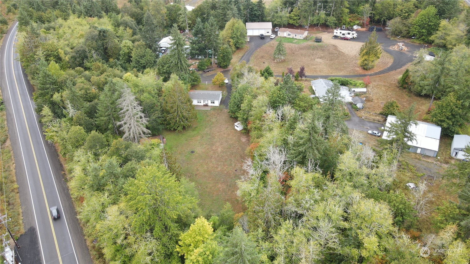 40 Southeast My Road Shelton, WA 98584 - Photo 2 of 25 an aerial view of residential house with outdoor space and trees all around