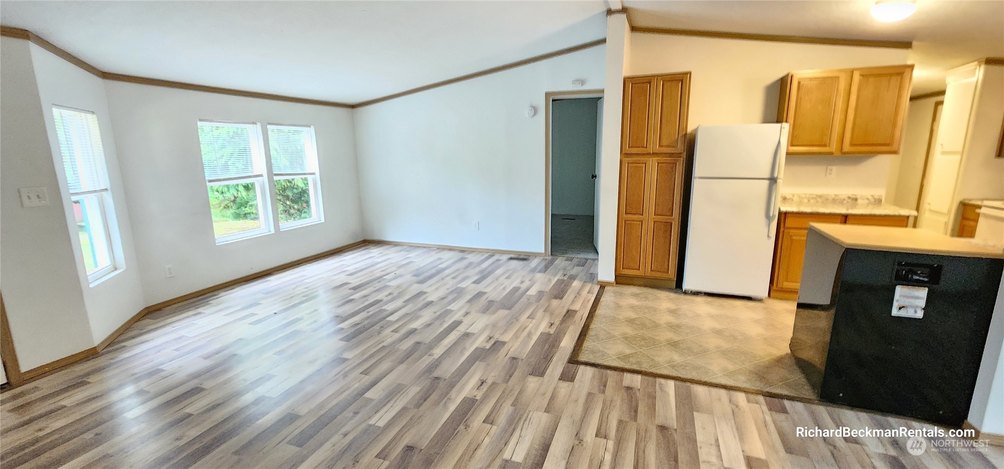 40 Southeast My Road Shelton, WA 98584 - Photo 3 of 25 a view of hallway with a large window and wooden floor