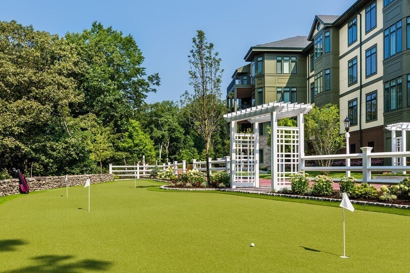 201 Sherman Road, Unit 403 Brookline, MA 02467 - Photo 3 of 25 a view of a house with swimming pool