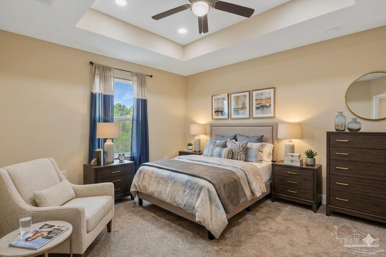 295 West Kingsfield Road Cantonment, FL 32533 - Photo 17 of 47 a bedroom with a bed and ceiling fan