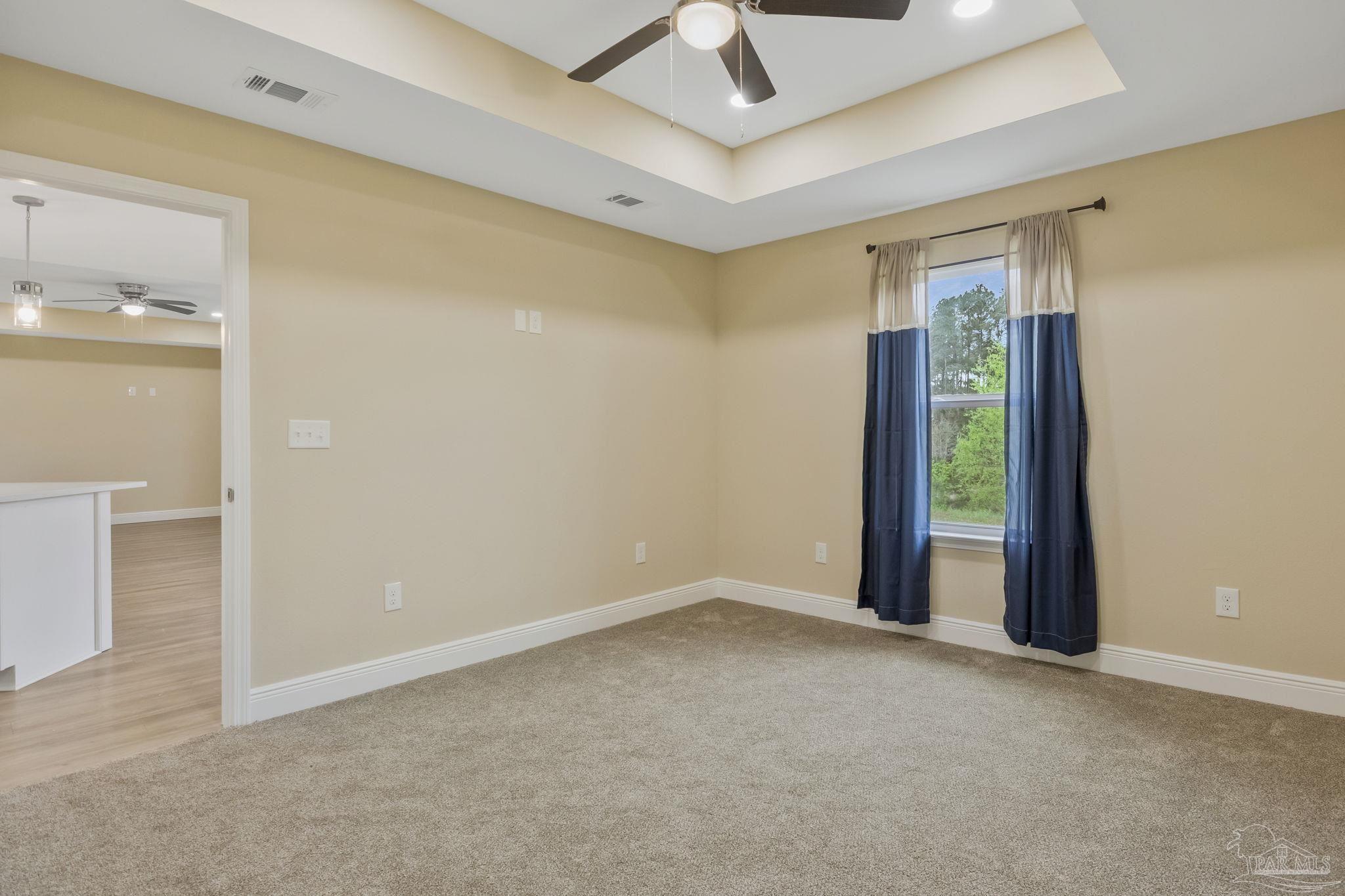 295 West Kingsfield Road Cantonment, FL 32533 - Photo 19 of 47 a view of an empty room with a window