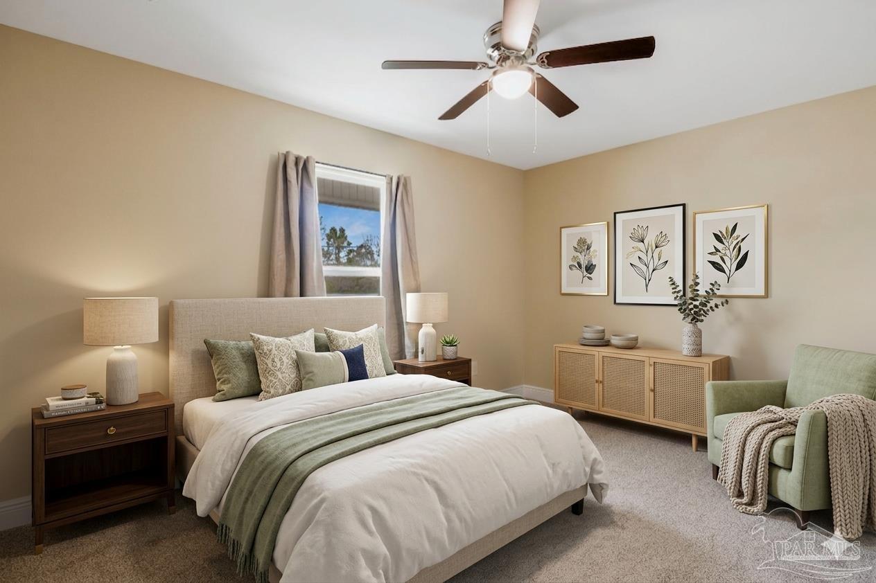 295 West Kingsfield Road Cantonment, FL 32533 - Photo 30 of 47 a bedroom with two beds and painting on the wall