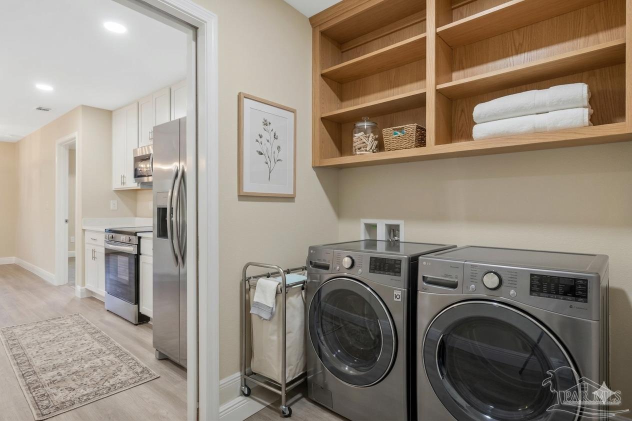 295 West Kingsfield Road Cantonment, FL 32533 - Photo 35 of 47 a view of a storage & utility room with washer and dryer