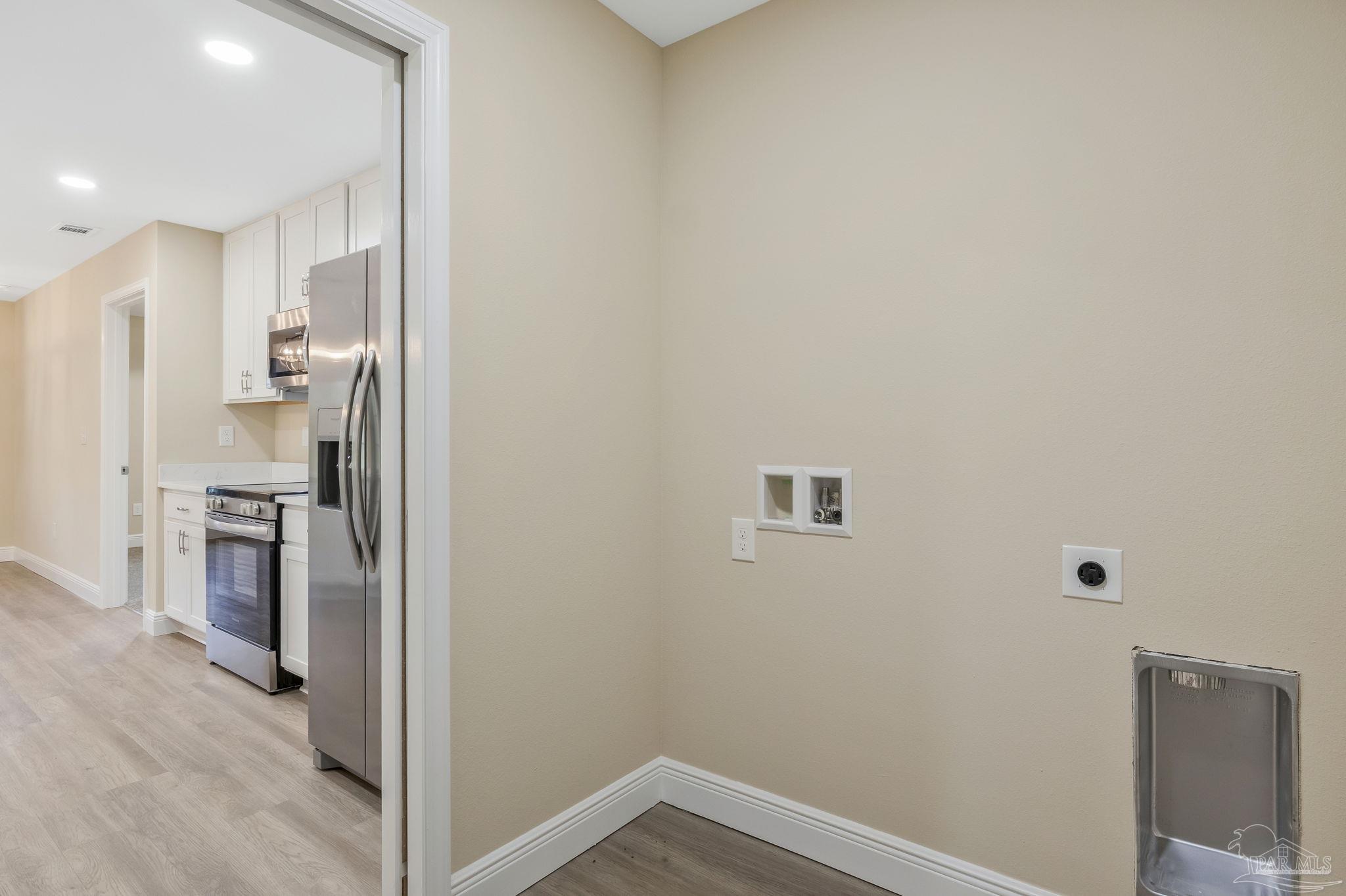 295 West Kingsfield Road Cantonment, FL 32533 - Photo 44 of 47 a view of a kitchen from the hallway