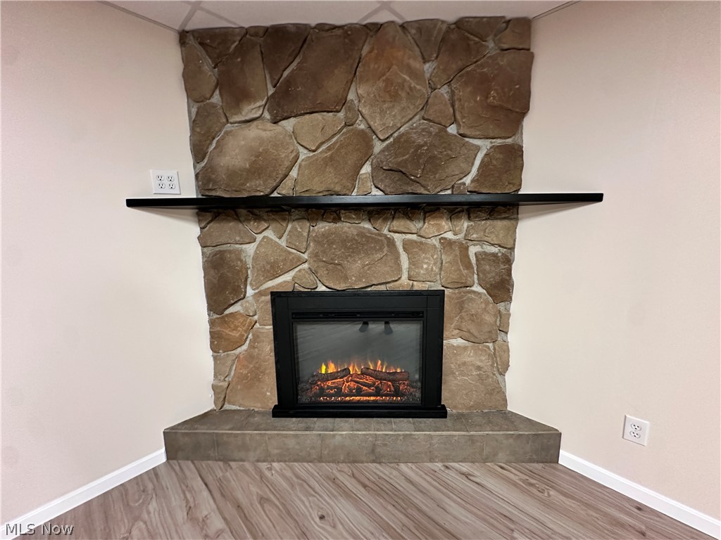 17437 Early Cemetary Road Newcomerstown, OH 43832 - Photo 43 of 49 electric fireplace in finished basement