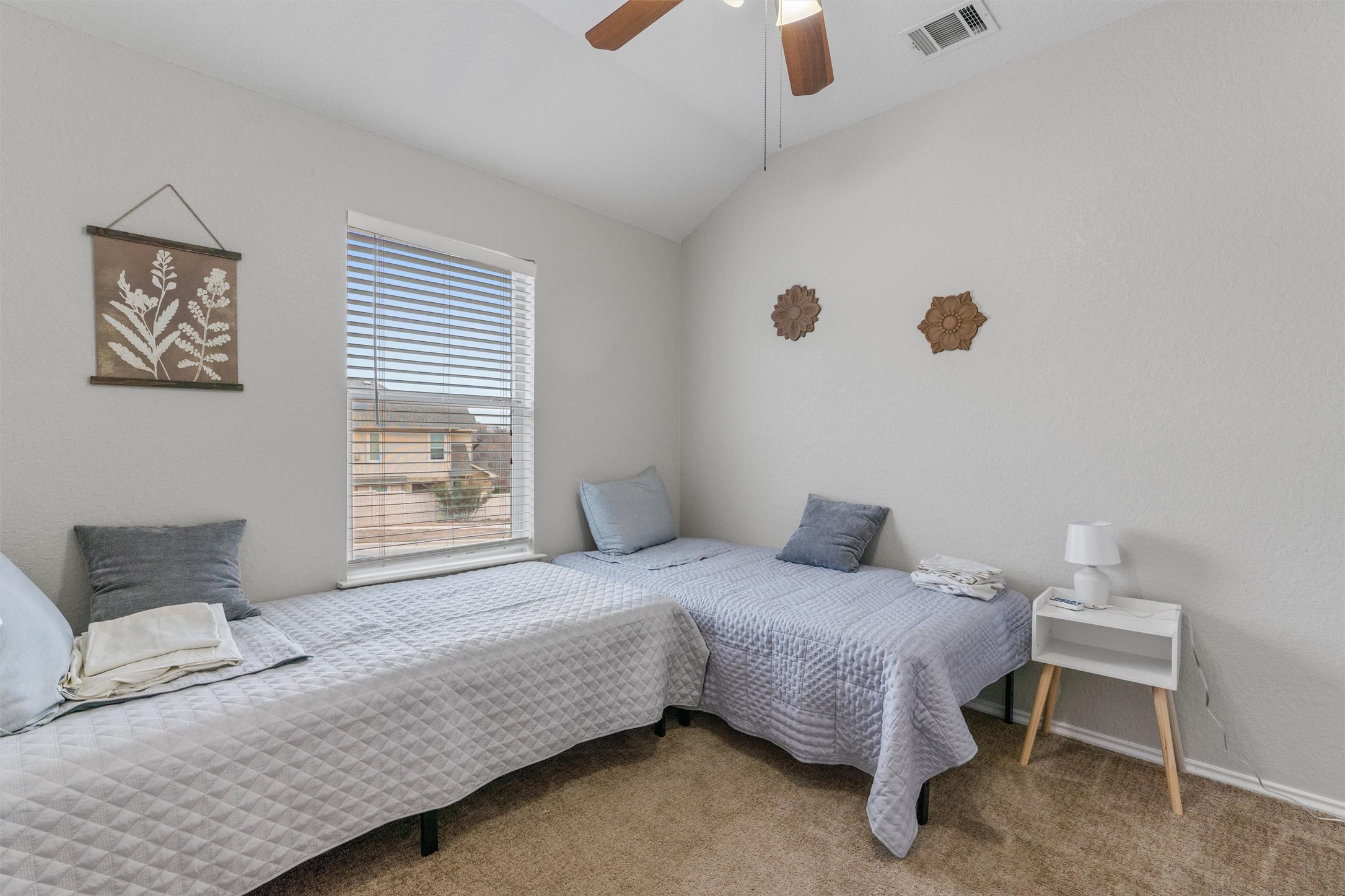 1587 Haynie Bend Round Rock, TX 78665 - Photo 17 of 25 a bedroom with a bed and a window