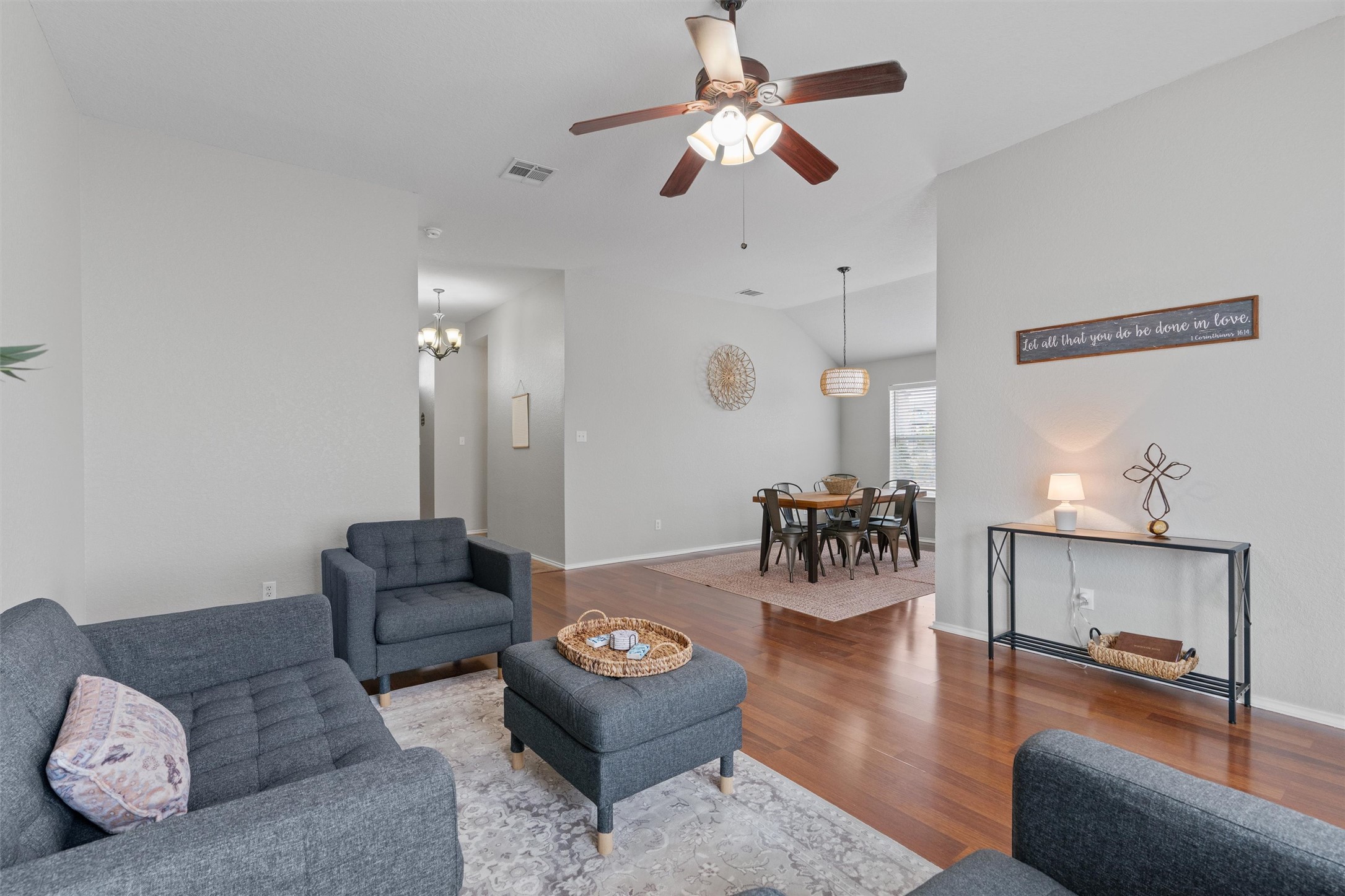 1587 Haynie Bend Round Rock, TX 78665 - Photo 7 of 25 a living room with furniture and a chandelier