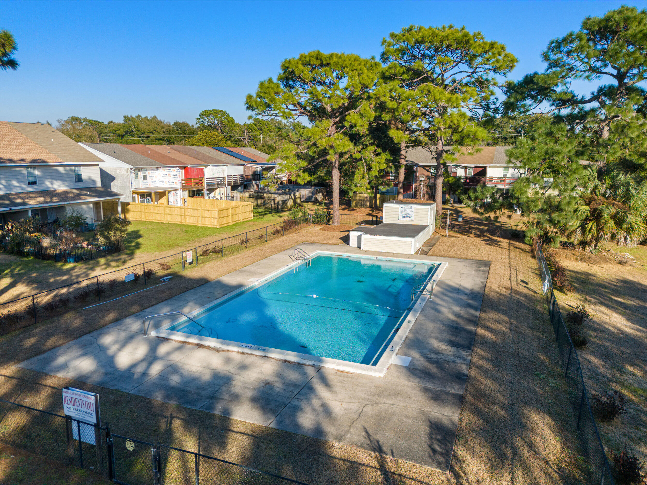 145 4th Avenue, Unit C2 Shalimar, FL 32579 - Photo 30 of 35 a view of a swimming pool with an outdoor seating