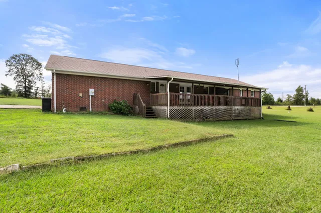 a view of a house with a garden