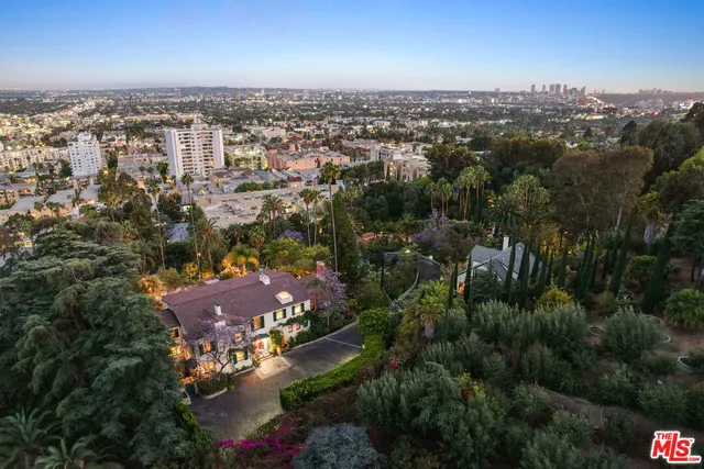 an aerial view of a city with lots of residential buildings