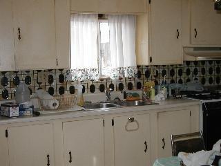 386 Ricardo Avenue Santa Rosa, CA 95407 - Photo 3 of 4 a kitchen with a sink and cabinets