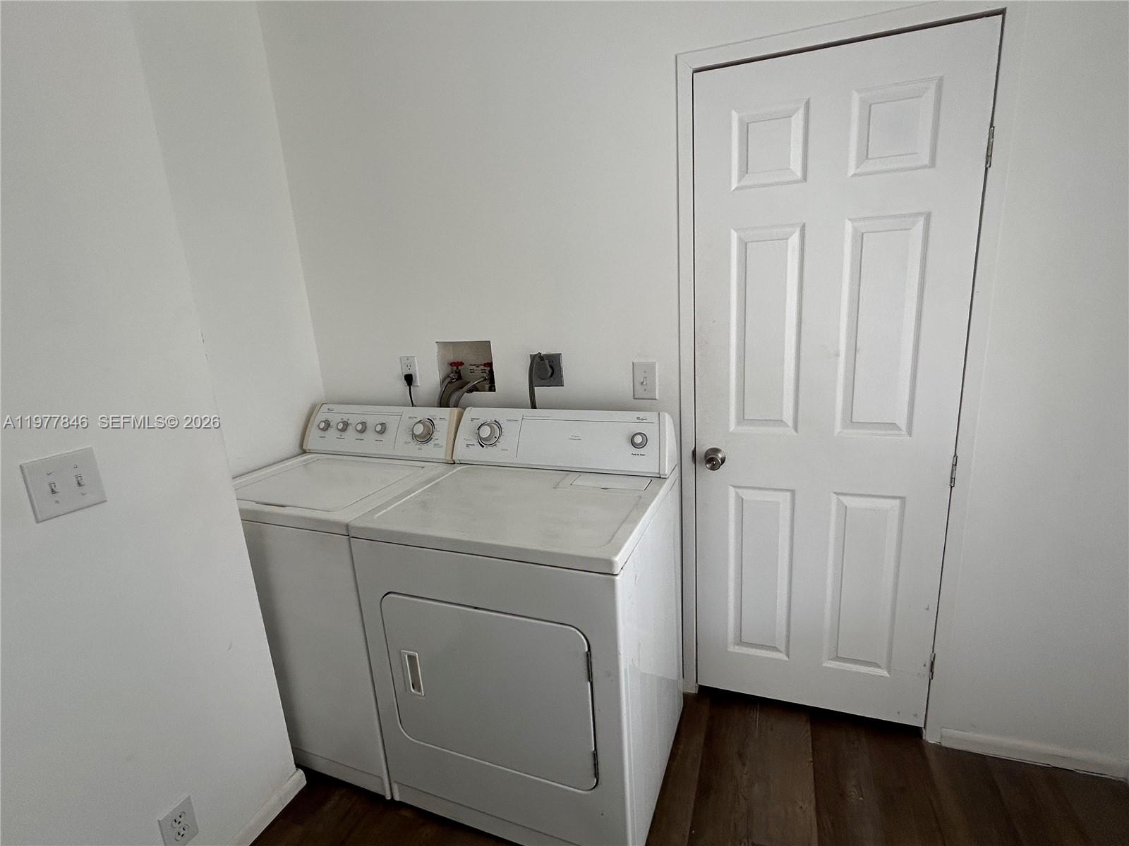 10467 South 228th Lane, Unit A Boca Raton, FL 33428 - Photo 21 of 27 a utility room with dryer and washer
