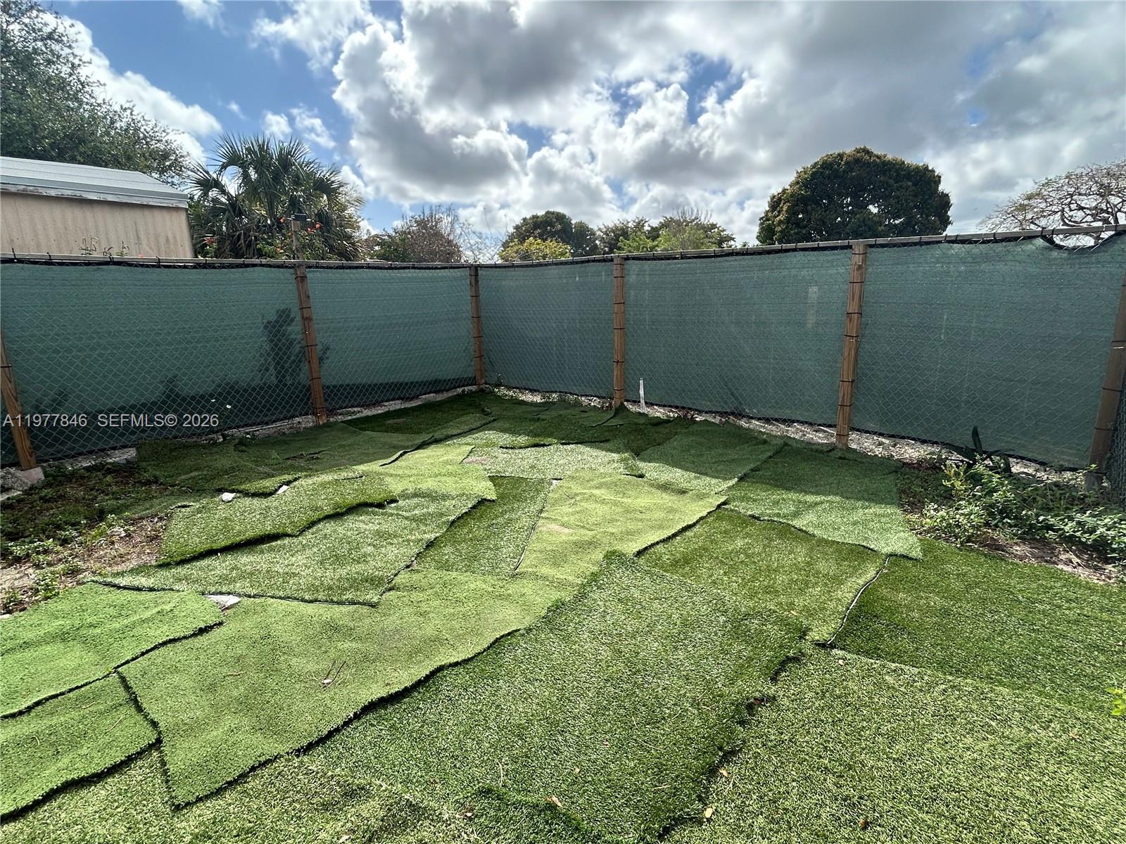 10467 South 228th Lane, Unit A Boca Raton, FL 33428 - Photo 26 of 27 a view of a backyard