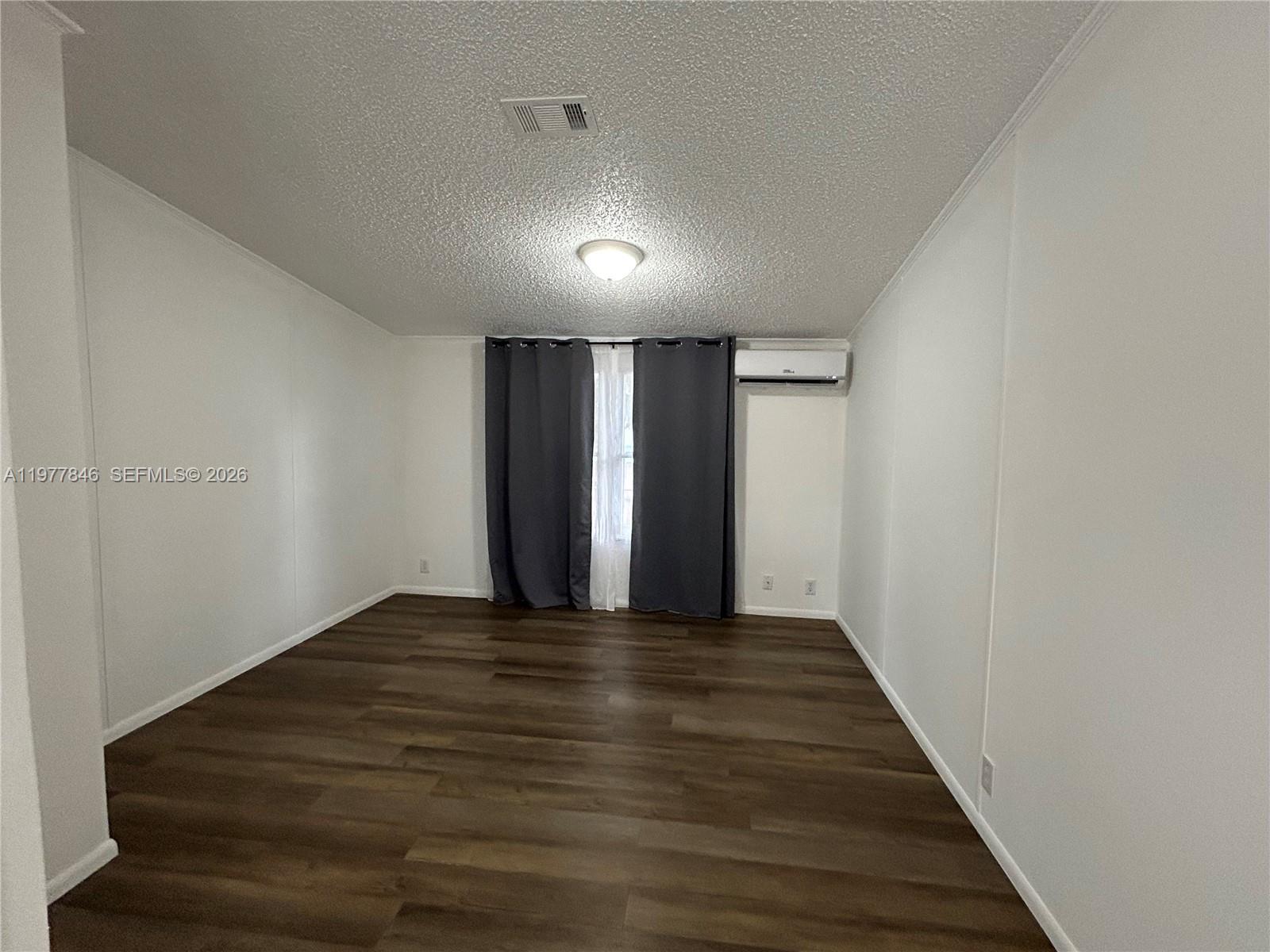 10467 South 228th Lane, Unit A Boca Raton, FL 33428 - Photo 7 of 27 a view of an empty room