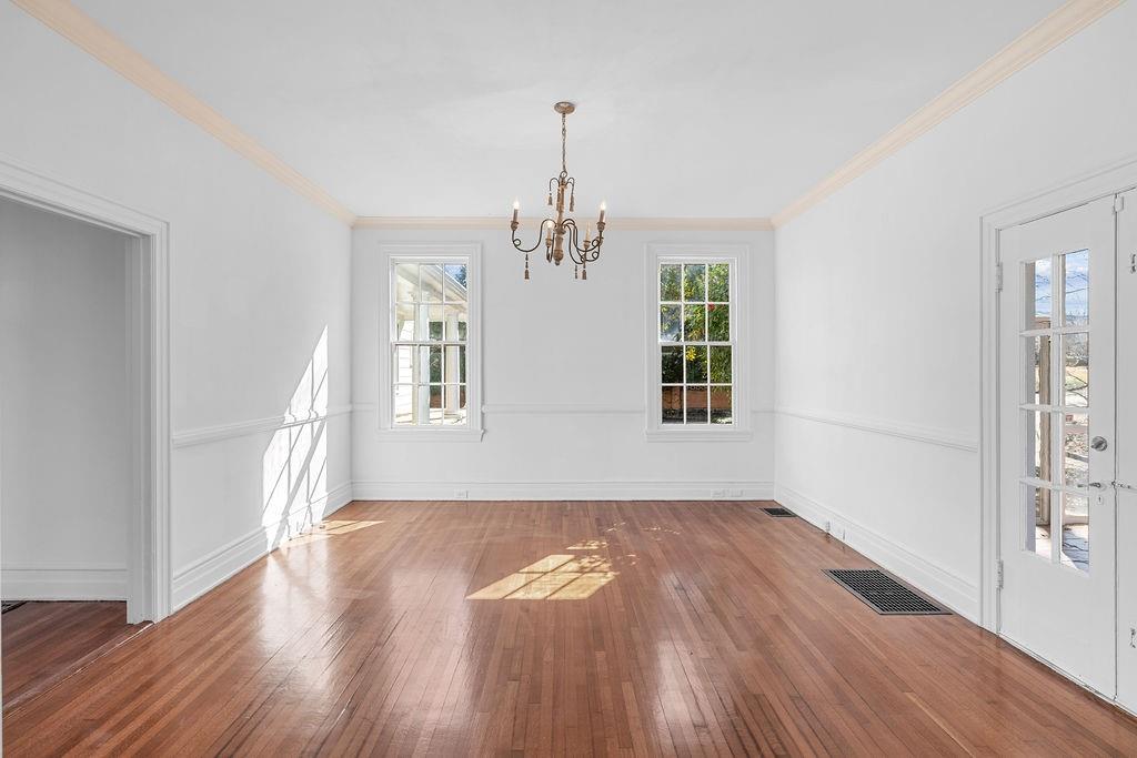 312 East 3rd Street Rome, GA 30161 - Photo 10 of 42 a view of empty room with wooden floor and fan