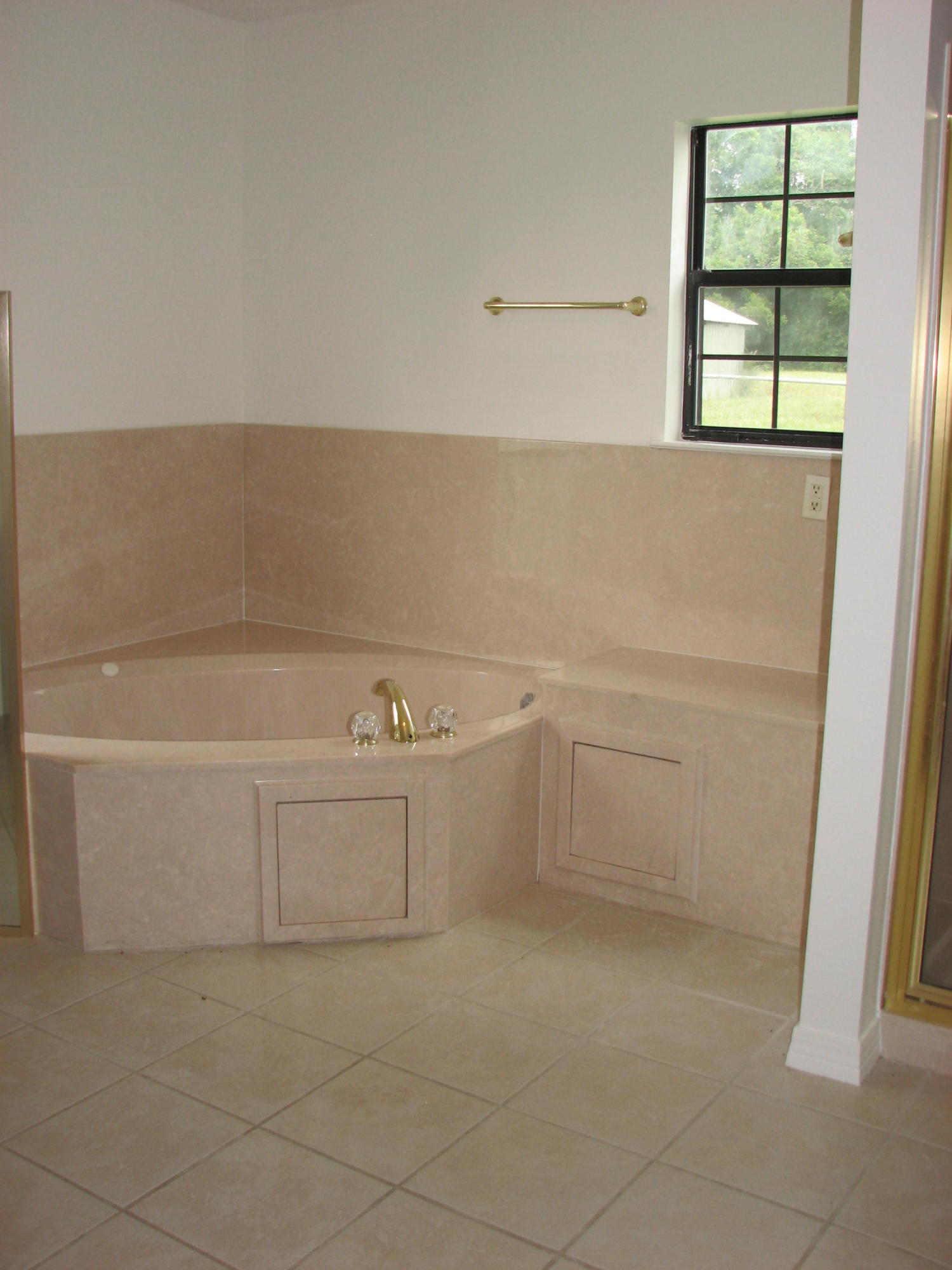 803 Melton Road Baker, FL 32531 - Photo 20 of 36 a view of an empty room with a window