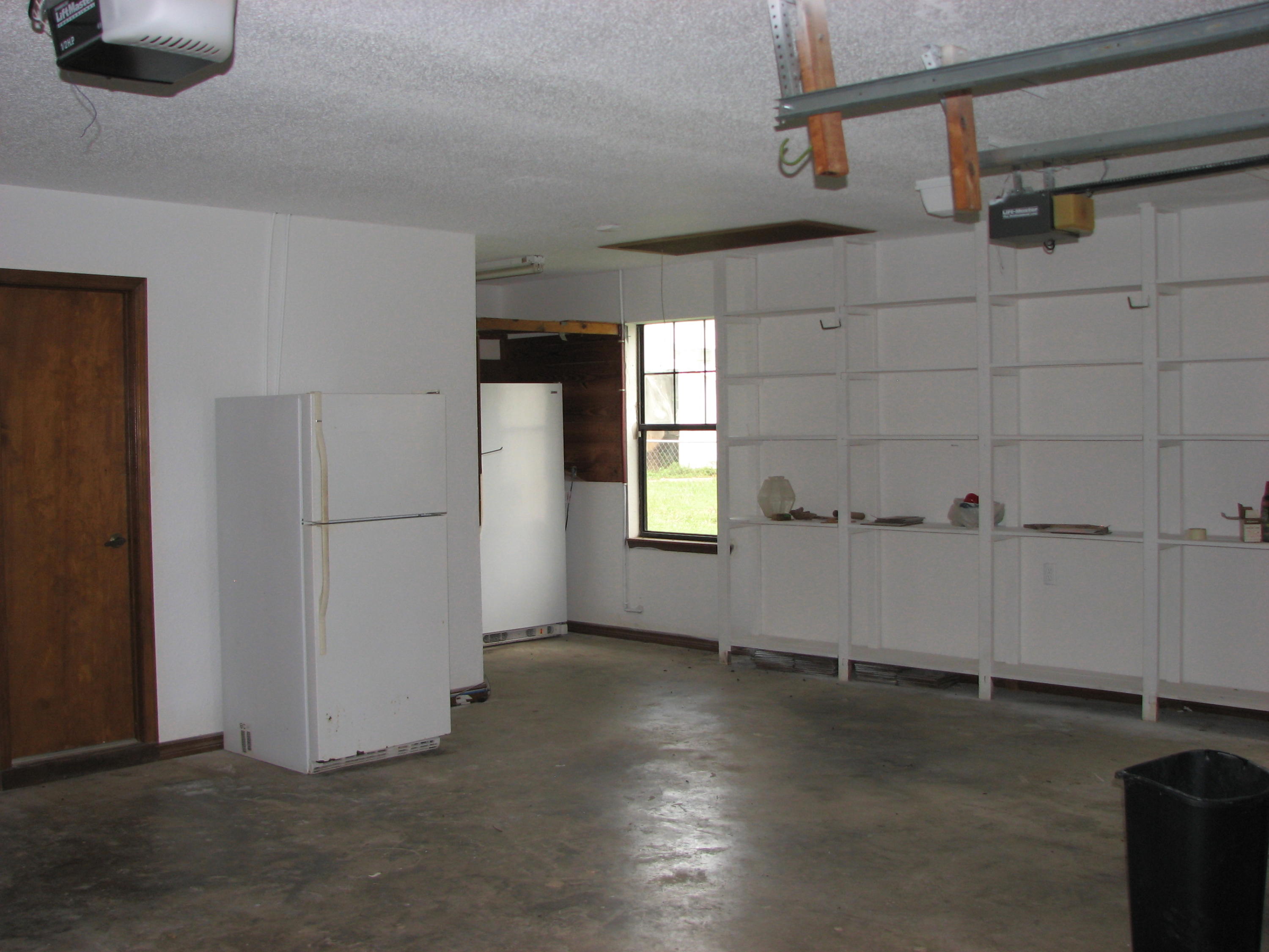 803 Melton Road Baker, FL 32531 - Photo 23 of 36 a view of a livingroom with an empty space and a window