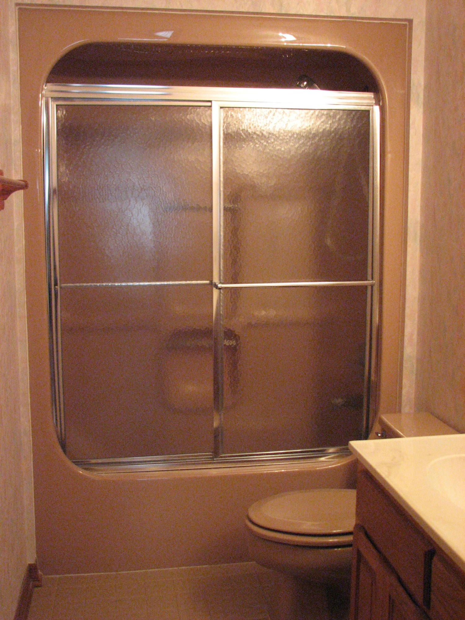 803 Melton Road Baker, FL 32531 - Photo 30 of 36 a bathroom with a shower and a toilet