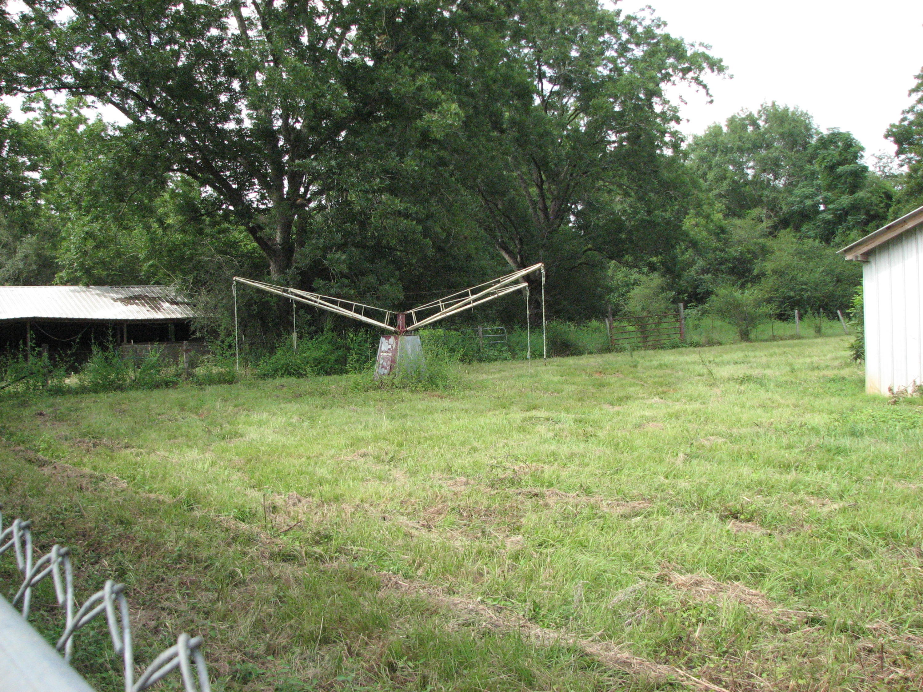 803 Melton Road Baker, FL 32531 - Photo 36 of 36 a backyard of a house with table and chairs