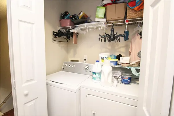 a utility room with dryer and washer