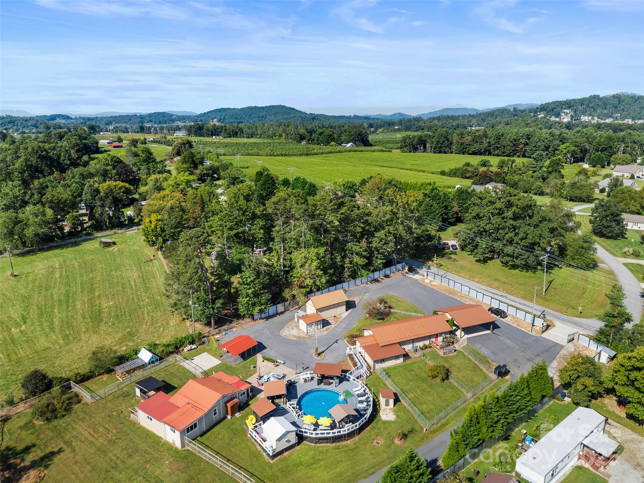1148 North Ridge Road Hendersonville, NC 28792 - Photo 26 of 42 an aerial view of a house with outdoor space
