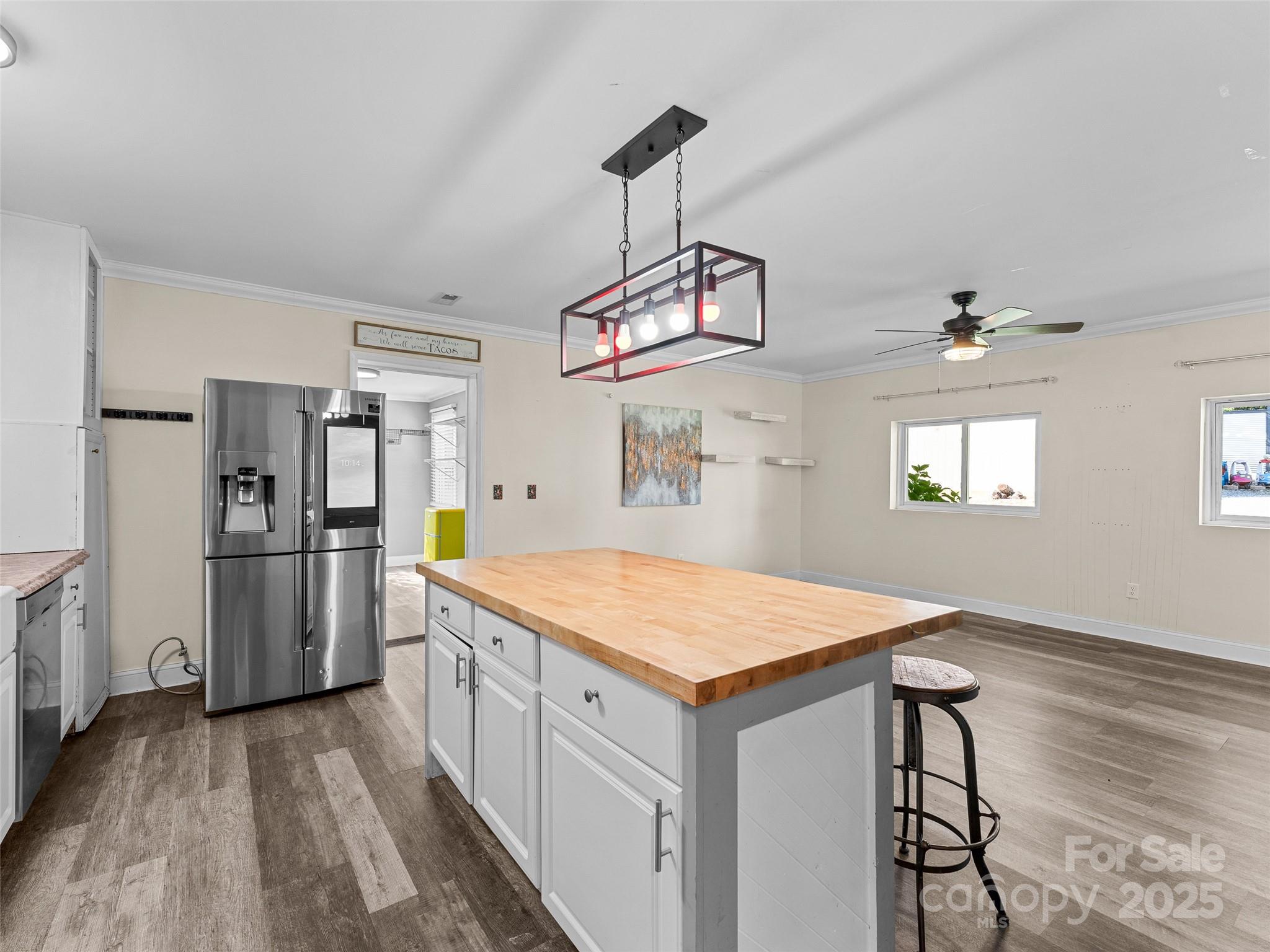 1148 North Ridge Road Hendersonville, NC 28792 - Photo 8 of 42 a kitchen that has a lot of counter space and wooden floor