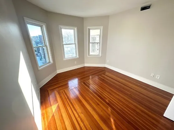 a view of an empty room and window