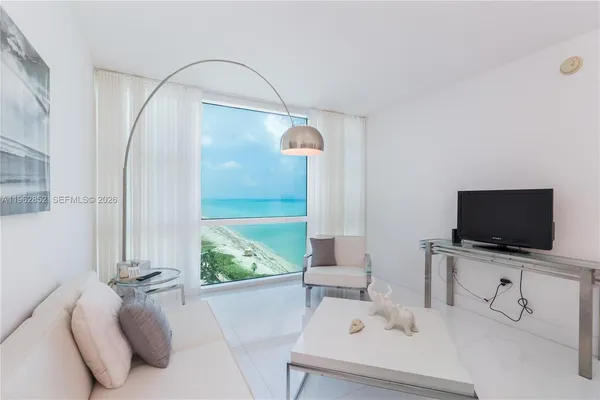 view of living room with furniture and flat screen tv