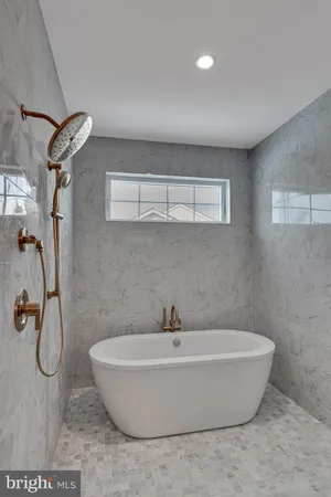 a bathroom with a white tub