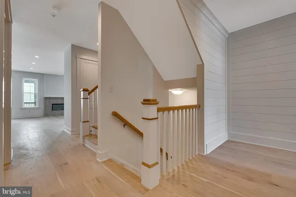 a view of a hallway view with staircase