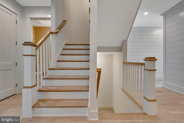 a view of entryway with wooden floor
