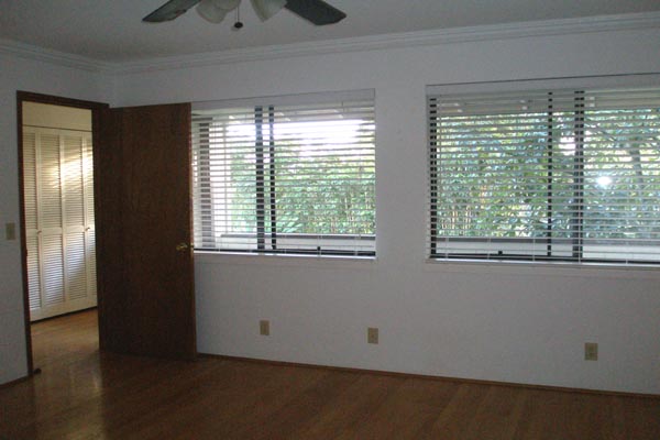 1291 Puuopae Road Kapaa, HI 96746 - Photo 18 of 25 a view of empty room with wooden floor and fan