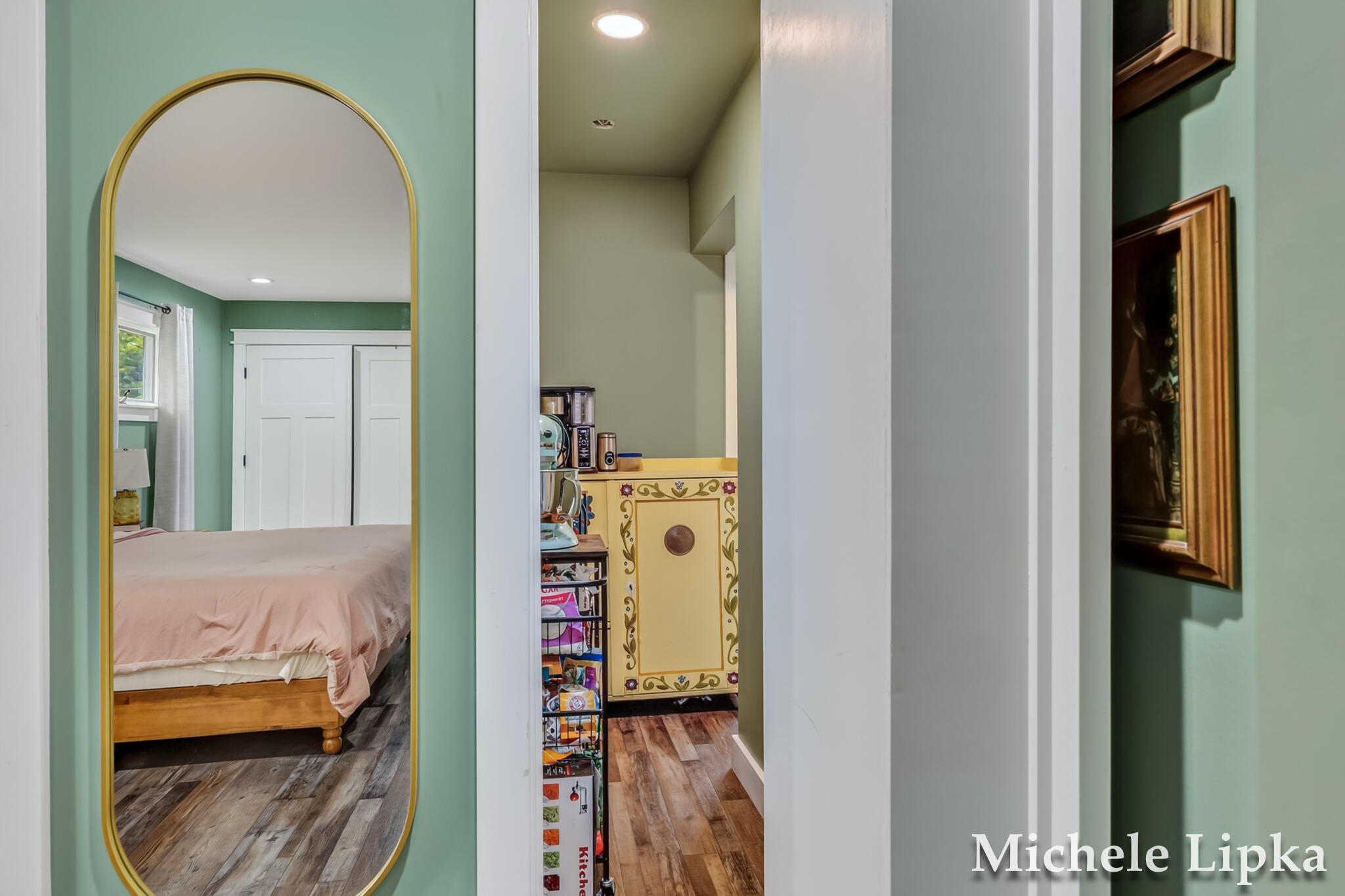2567 Shettler Road Muskegon, MI 49444 - Photo 20 of 38 Primary Bedroom Opening Bookcase