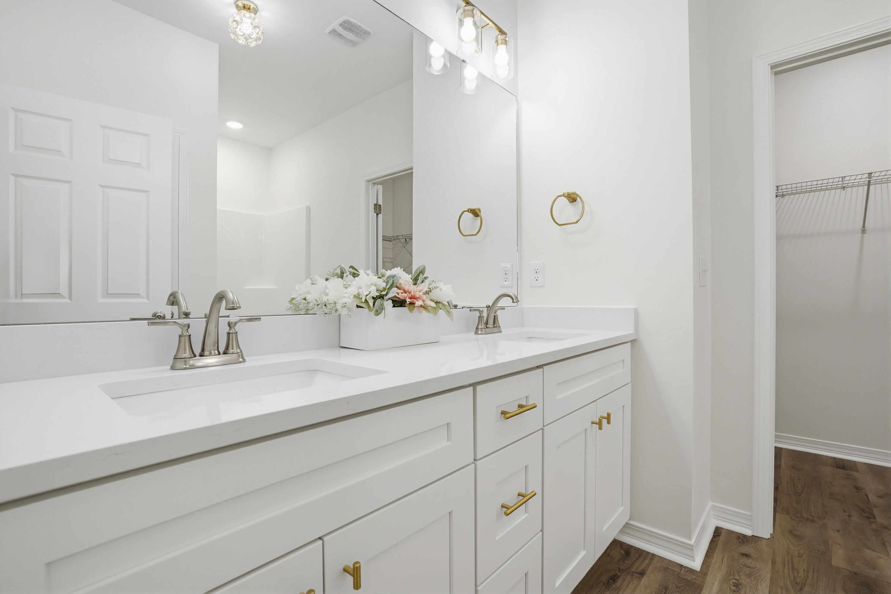 3810 Golden Acres Circle Crestview, FL 32539 - Photo 5 of 9 a bathroom with a sink double vanity and a mirror