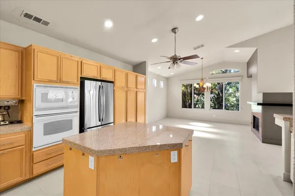 a view of a lake with a house in the background