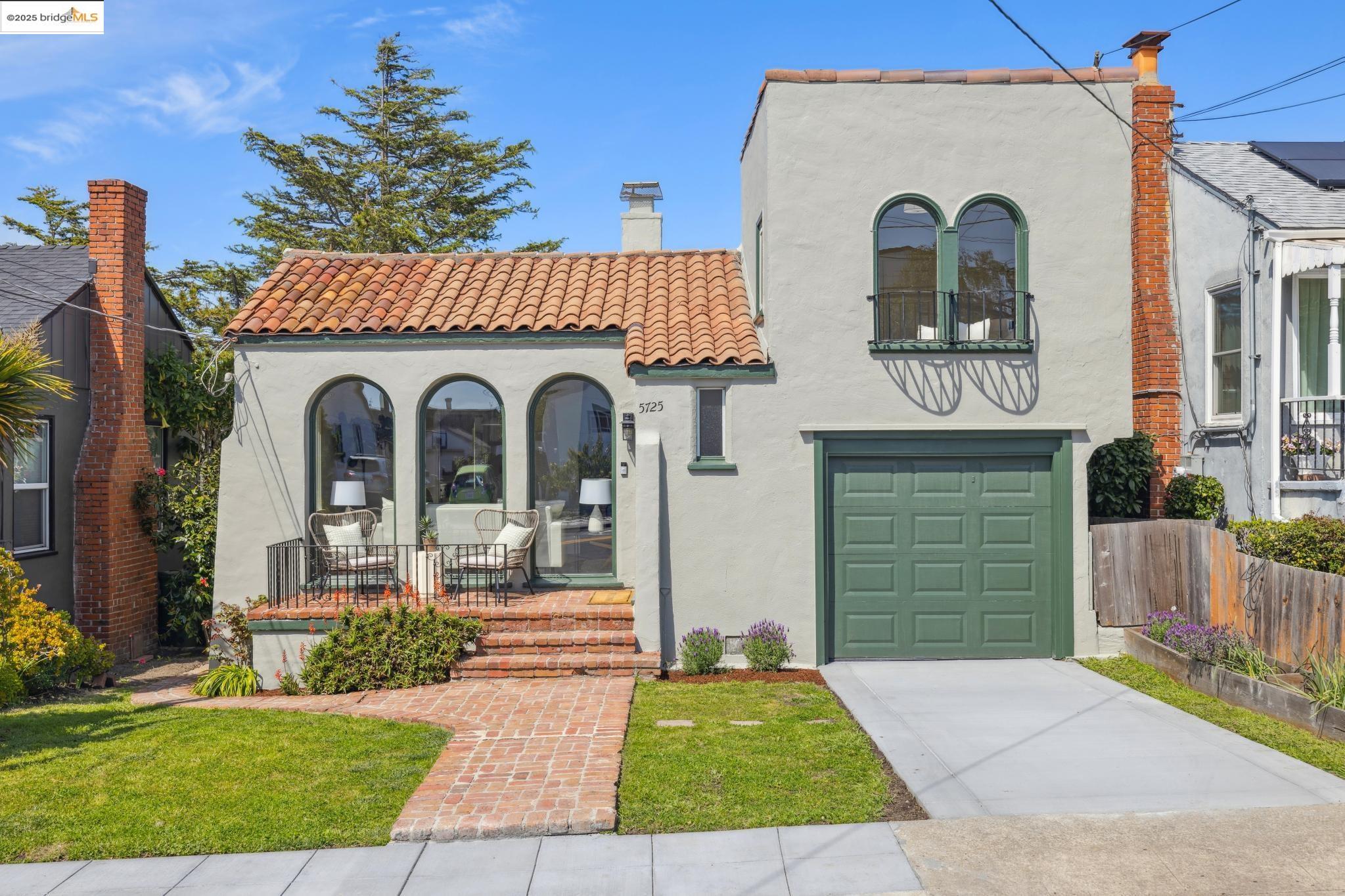 5725 Alta Punta Avenue El Cerrito, CA 94530 - Photo 1 of 1 a front view of a house with a yard