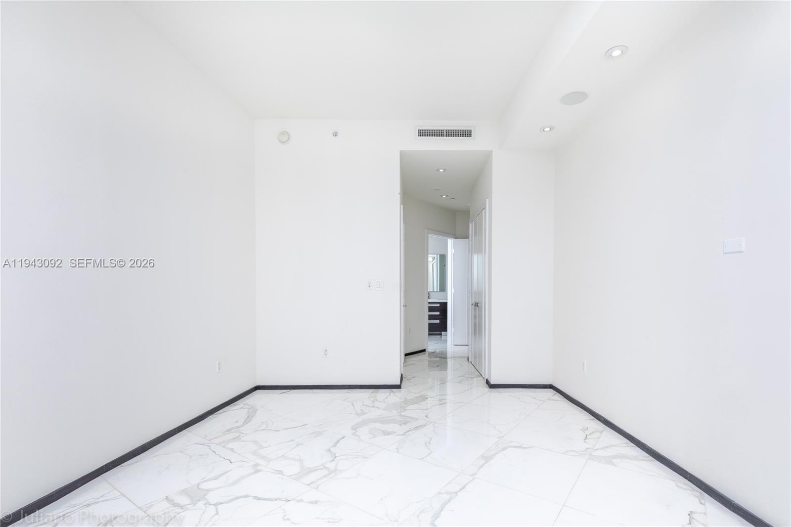 901 Brickell Key Boulevard, Unit 3407 Miami, FL 33131 - Photo 19 of 44 a view of empty room