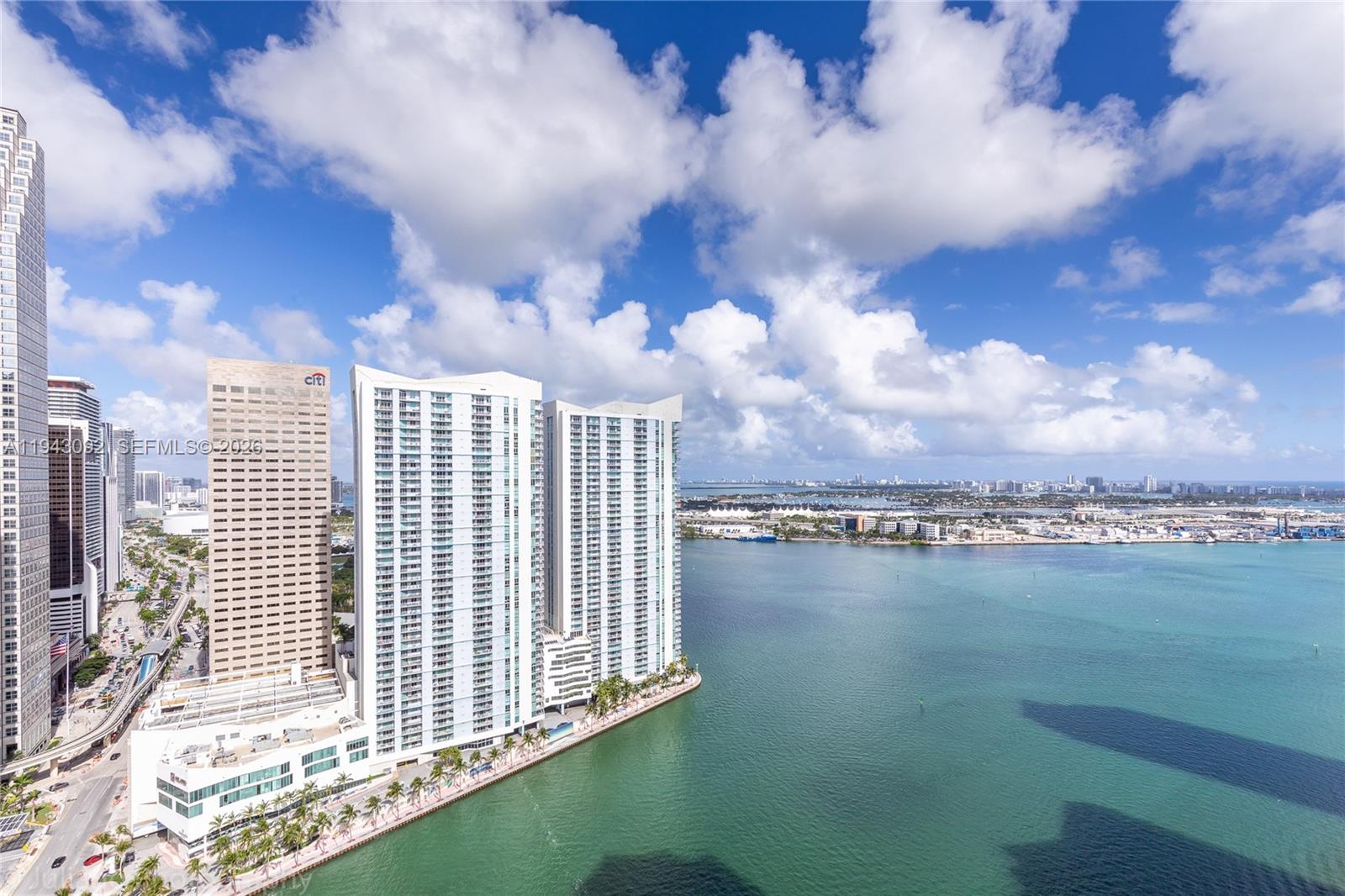 901 Brickell Key Boulevard, Unit 3407 Miami, FL 33131 - Photo 26 of 44 a view of city and lake