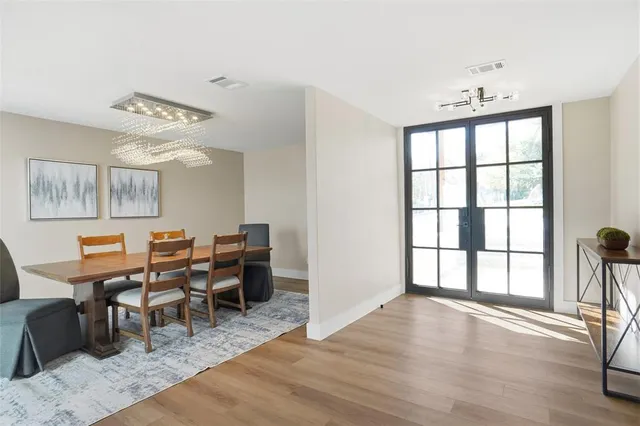 a workspace with furniture window and wooden floor